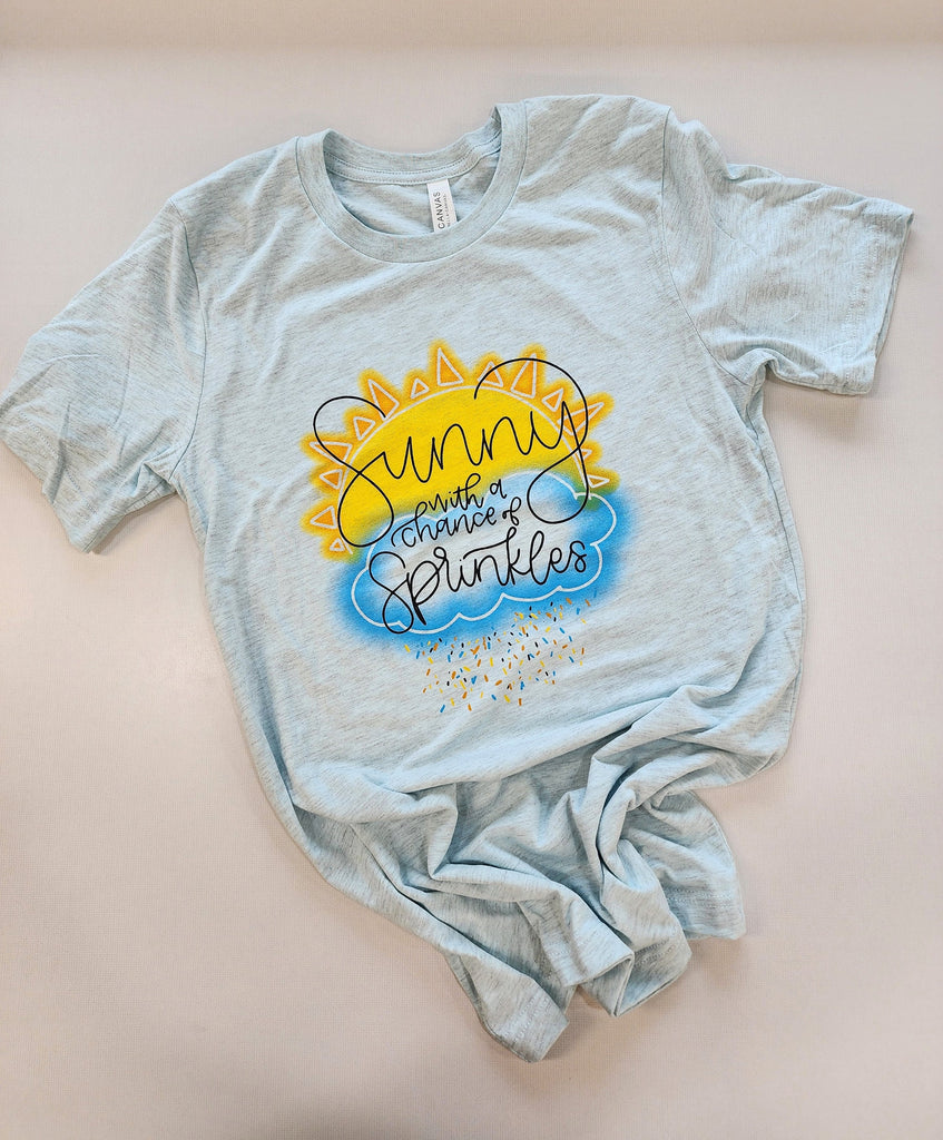 Sunny with a Chance of Sprinkles  - Unisex Bella Canvas Heather Prism Ice Blue T-shirt